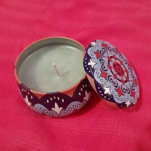 A Box Of 2 Decorative Tin Candles