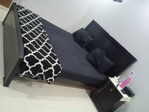 king saiz bed with said table for sale available 