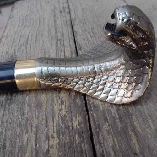 Cobra walking stick ,can stick with sword 