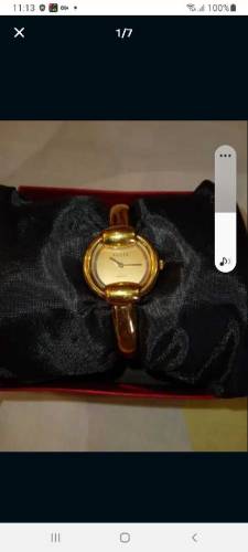 original imported luxury gucci gold plated watch made in switzerland
