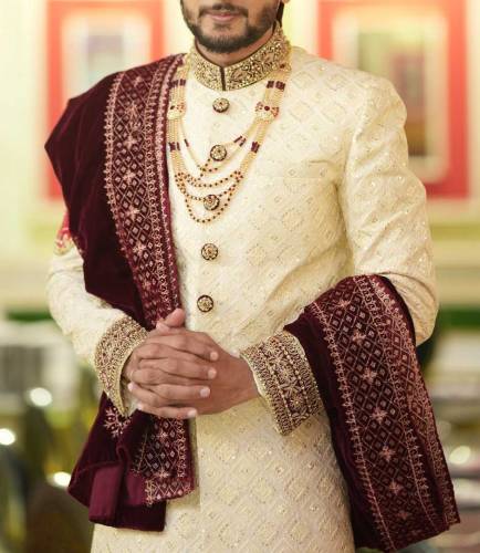 Off white embroidery sherwani with collar embellishment.