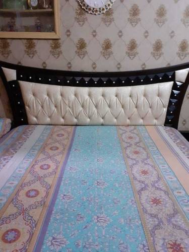 fancy bed and dressing