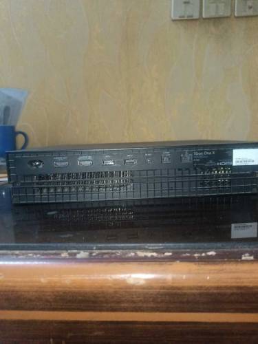 Xbox one x without any controllers boxes and wires 