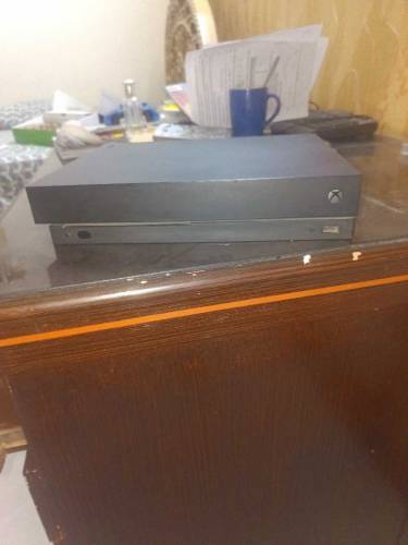 Xbox one x without any controllers boxes and wires 