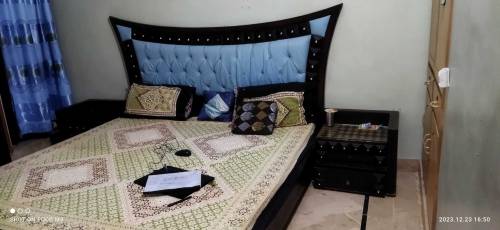bed with mattress with side tables and dressing table 