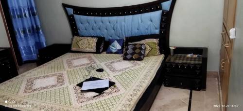 bed with mattress with side tables and dressing table 