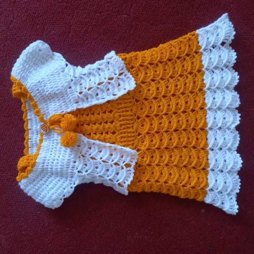 Baby girl crochet frok with jacket.