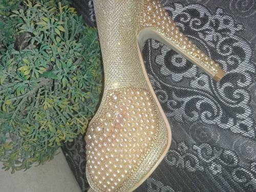 Golden pearl heels