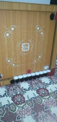 Small size carrom board