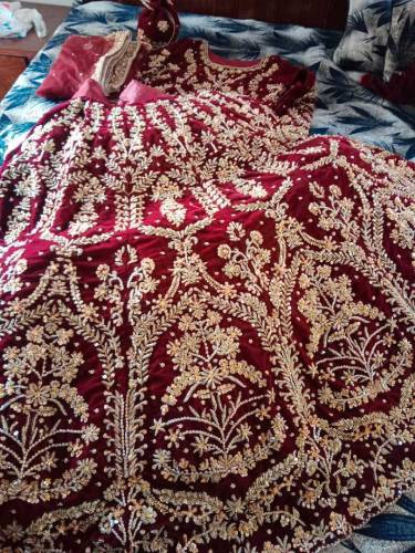 Velvet maroon lehnga designed by MNR