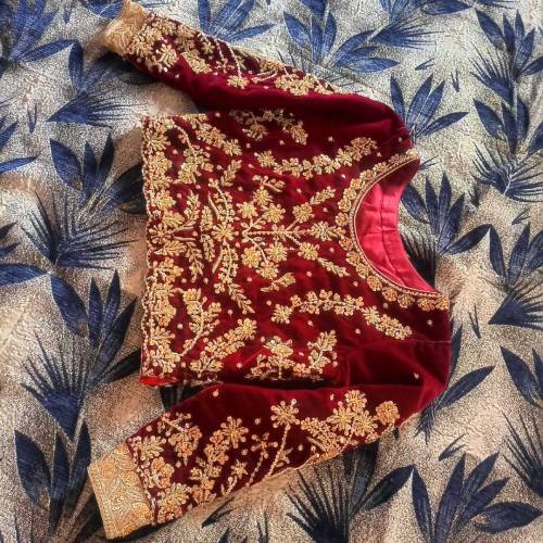 Velvet maroon lehnga designed by MNR