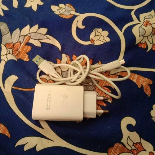 Android phone with charger 