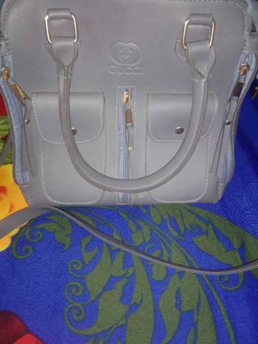 Hand bag with free bracelet