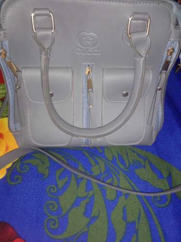 Hand bag with free bracelet