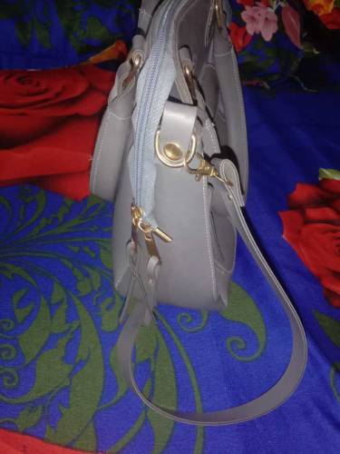 Hand bag with free bracelet