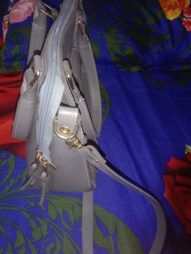 Hand bag with free bracelet