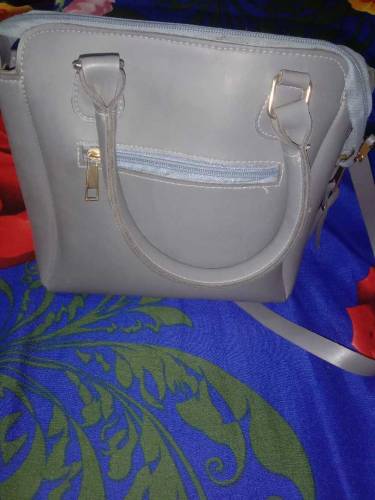 Hand bag with free bracelet