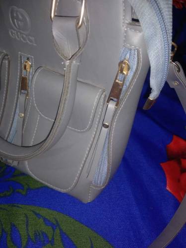 Hand bag with free bracelet