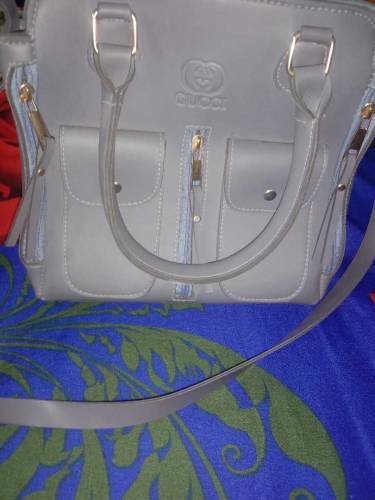 Hand bag with free bracelet