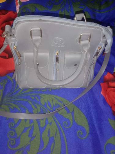 Hand bag with free bracelet