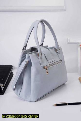 •  Material: PU Leather•  Bag Type: Handbag•