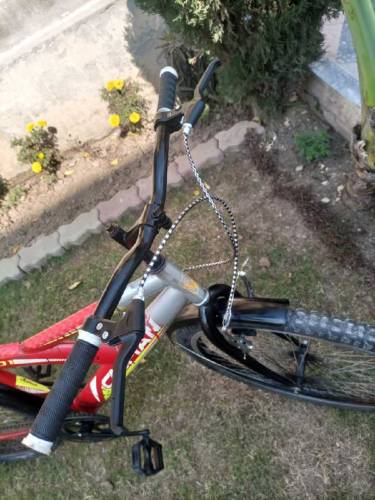 VERY GOOD CONDITION CYCLE 26 INCH CYCLE FOR SALE OF RED COLOUR