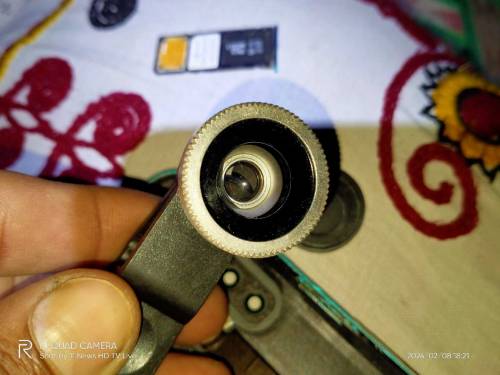 Zooming camera lens 
