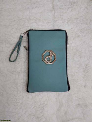 •  Material: Rexine•Product Type: Mobile Pouch•Product