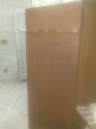 heavy wooden wardrobe
