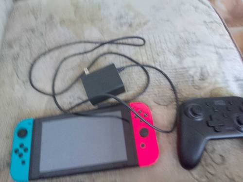 Nitendo switch with controller and without dock with cjarger