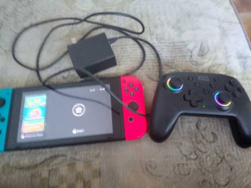 Nitendo switch with controller and without dock with cjarger