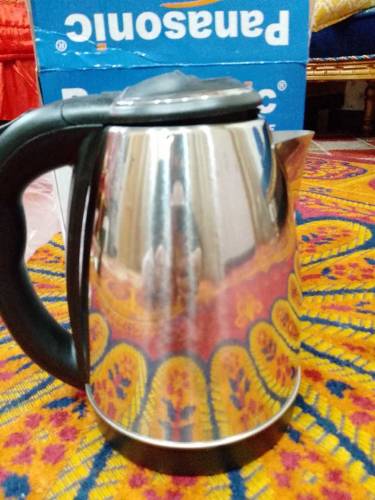Electric kettle for tea and egg boilling