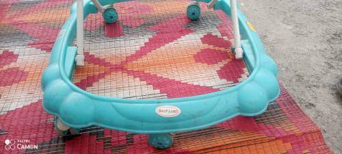 Baby walker 09/10 condition , music system