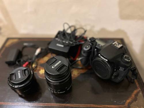 DSLR canon 60D available with tripod stand, original charger and etc