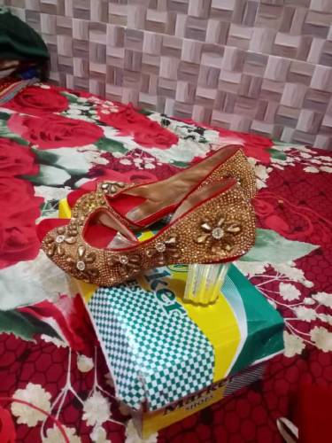 bridal lengha with beautiful jwellary purse and sandle