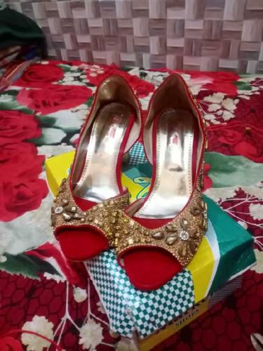 bridal lengha with beautiful jwellary purse and sandle