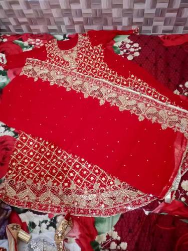 bridal lengha with beautiful jwellary purse and sandle