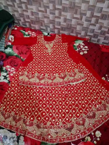bridal lengha with beautiful jwellary purse and sandle