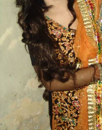 Black shirt and yellow lengha combination 