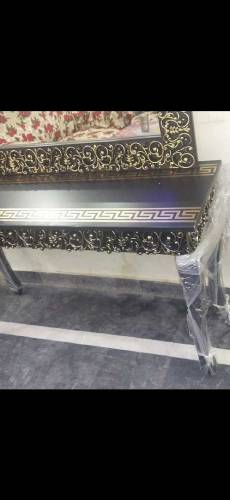 Solid wood console with frame.