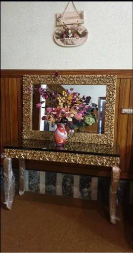 Solid wood console with frame.