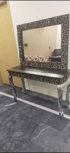 Solid wood console with frame.