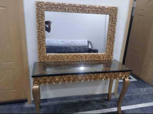 Solid wood console with frame.