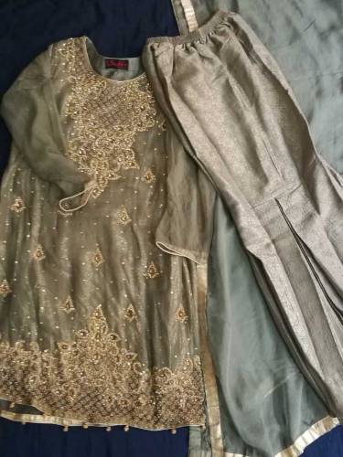 Party wear frock with sharara tila and stones work beautiful.