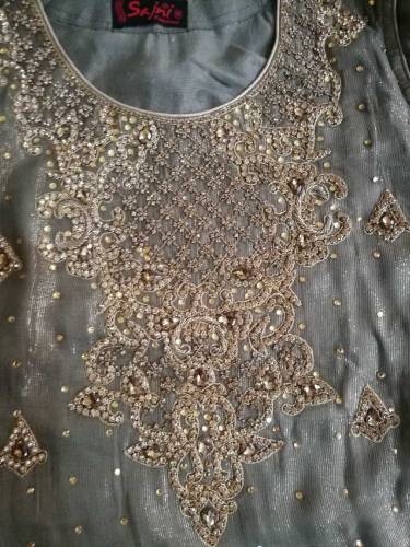 Party wear frock with sharara tila and stones work beautiful.