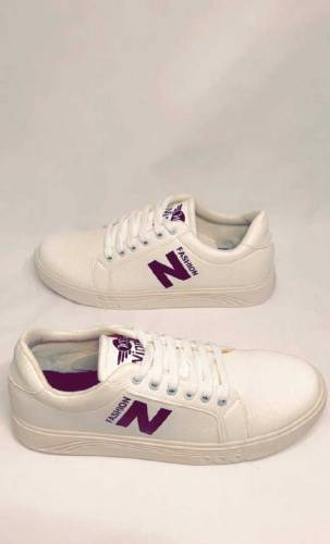 •  Synthetic Calf Leather•  Tonal Matte Rubber Sole•  Padded Back Coll