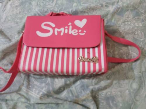 smile pink purse