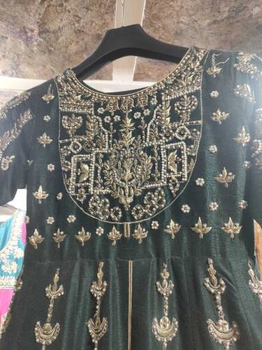 This is a green color maxi with a tissue lehenga underneath it plus