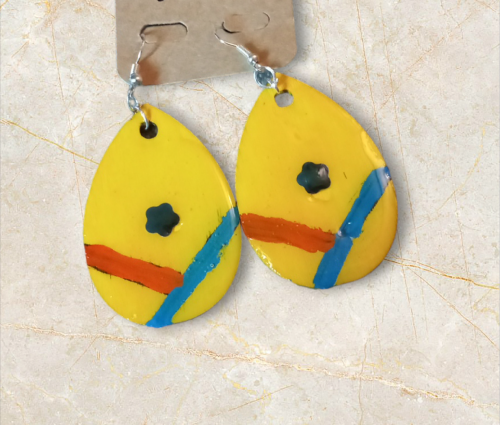 Wooden earrings of yellow color