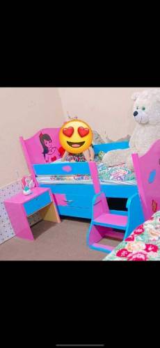 kids bed and medium size cute cupboard